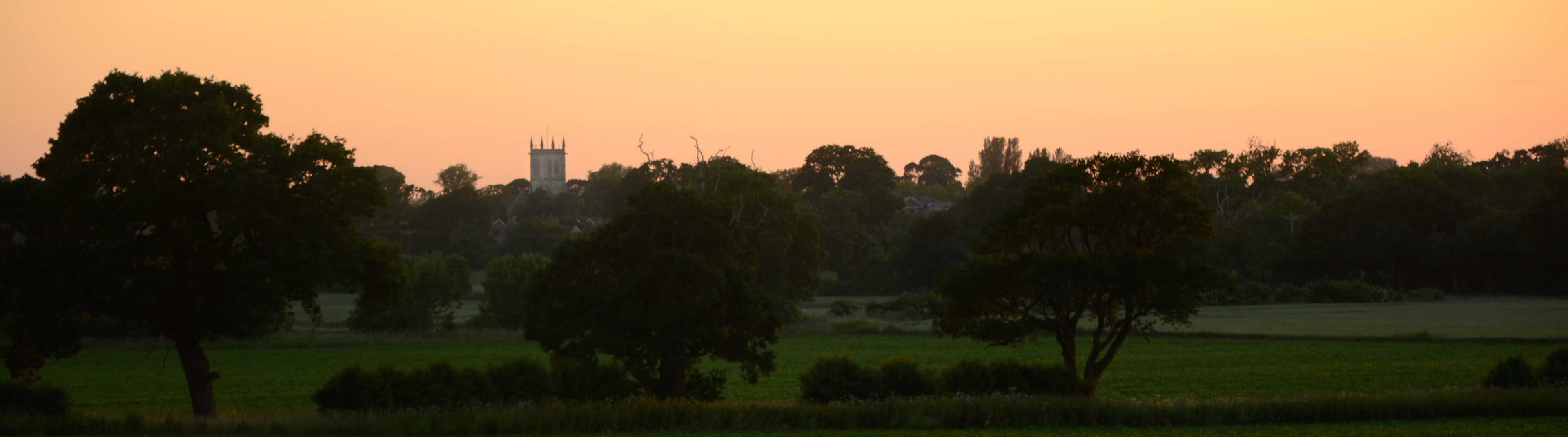 Photograph of Escrick at dusk showing St Helen's church